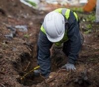 Worker digging